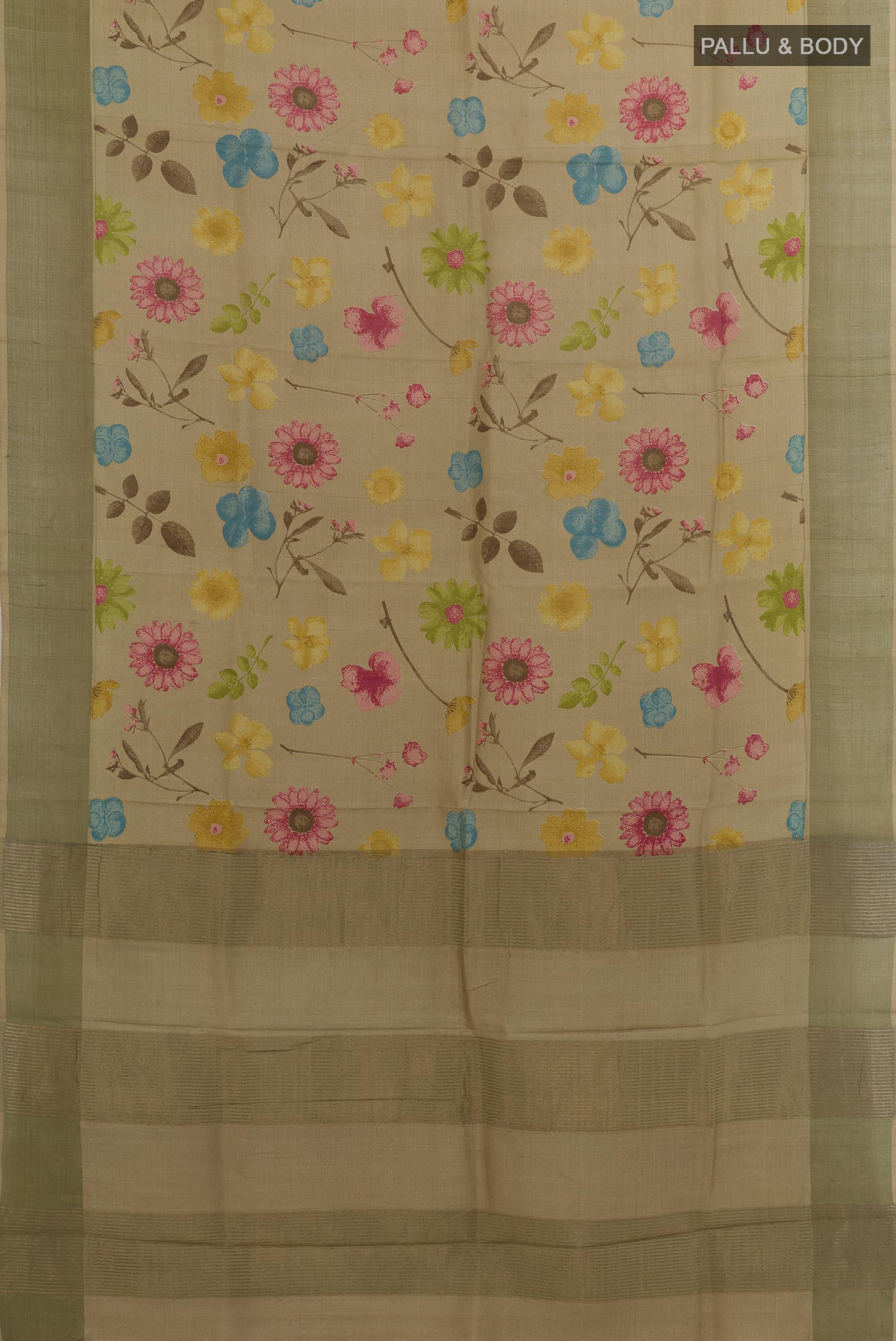 Flat view of Beige Tussar Silk Saree with Printed design on the body and Zari Border. 