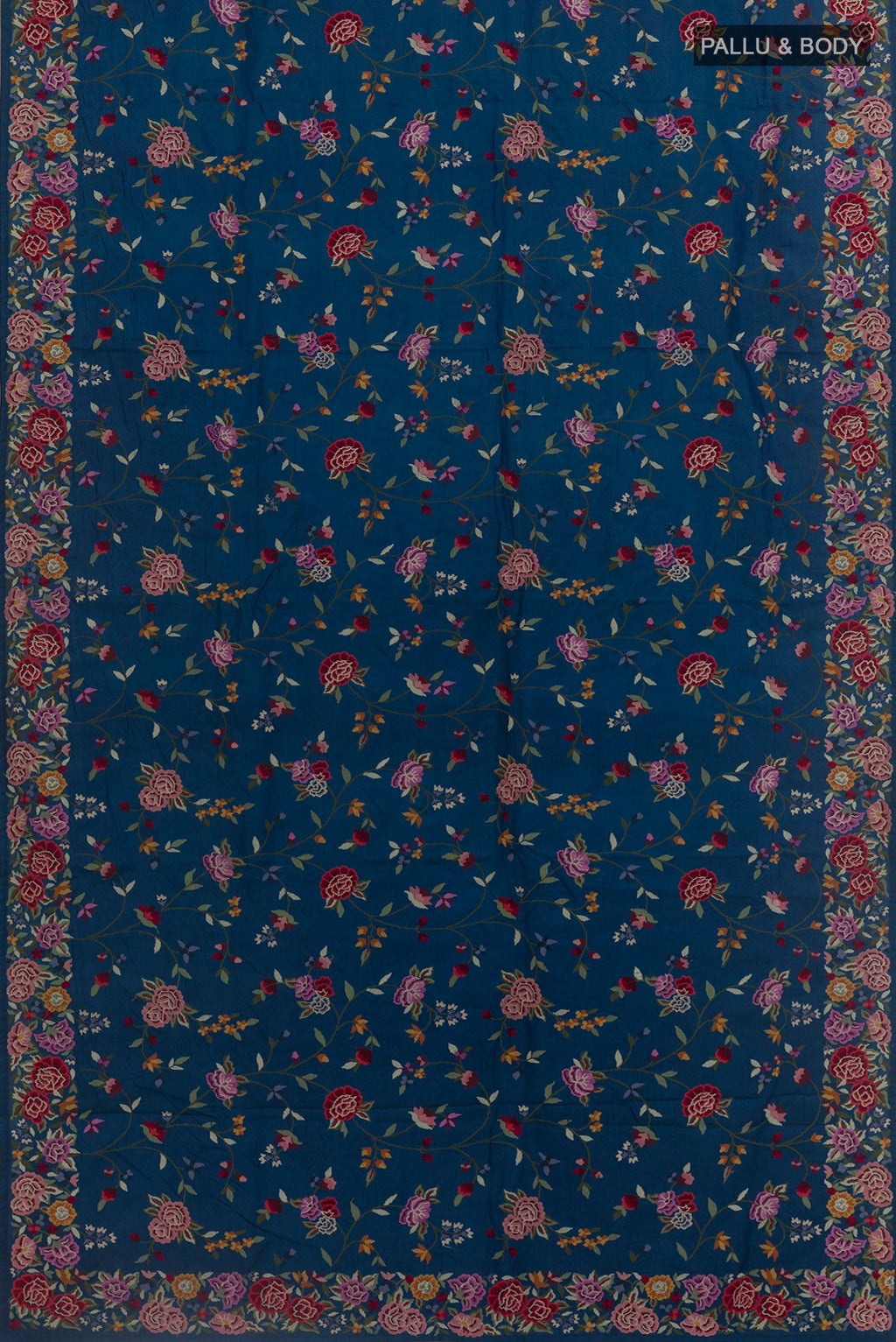 Flat view of Blue Tussar Silk Saree with Embroidery on the body and Embroidery Border. 