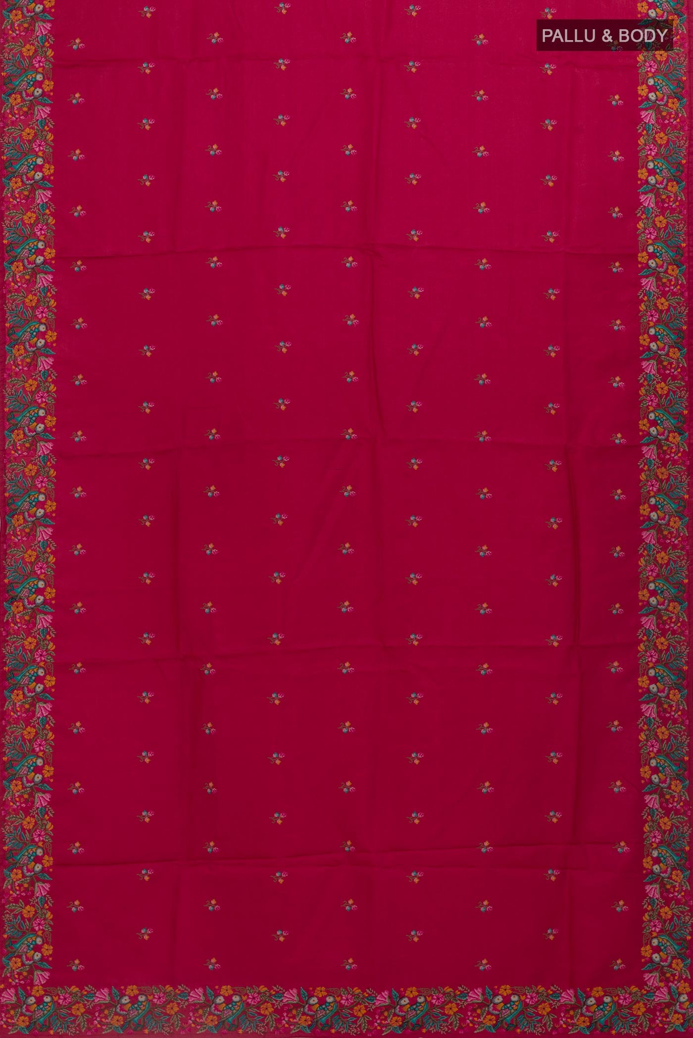 Flat view of Red Tussar Silk Saree with Embroidery on the body and Embroidery Border. 