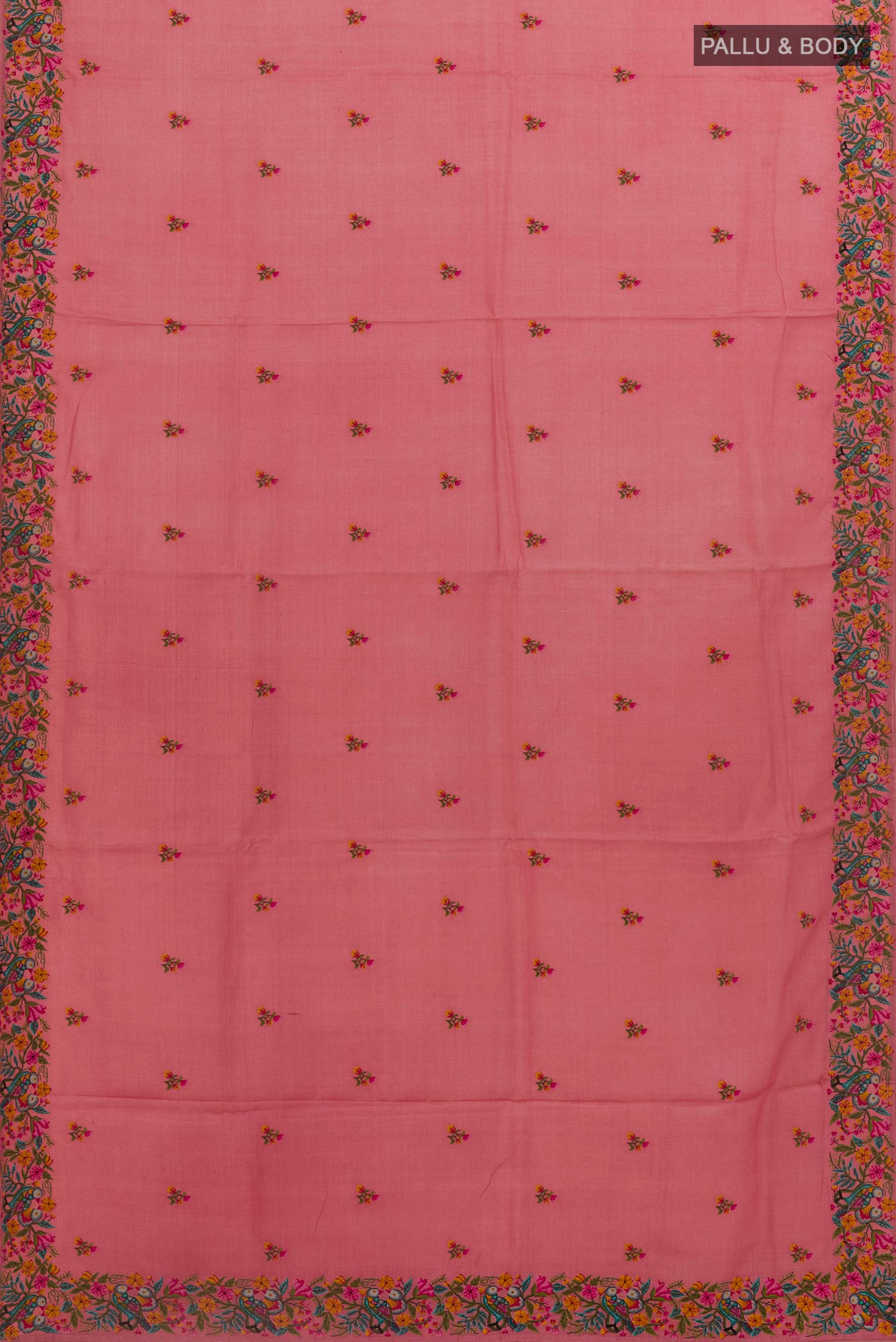 Flat view of Pink Tussar Silk Saree with Embroidery on the body and Embroidery Border. 