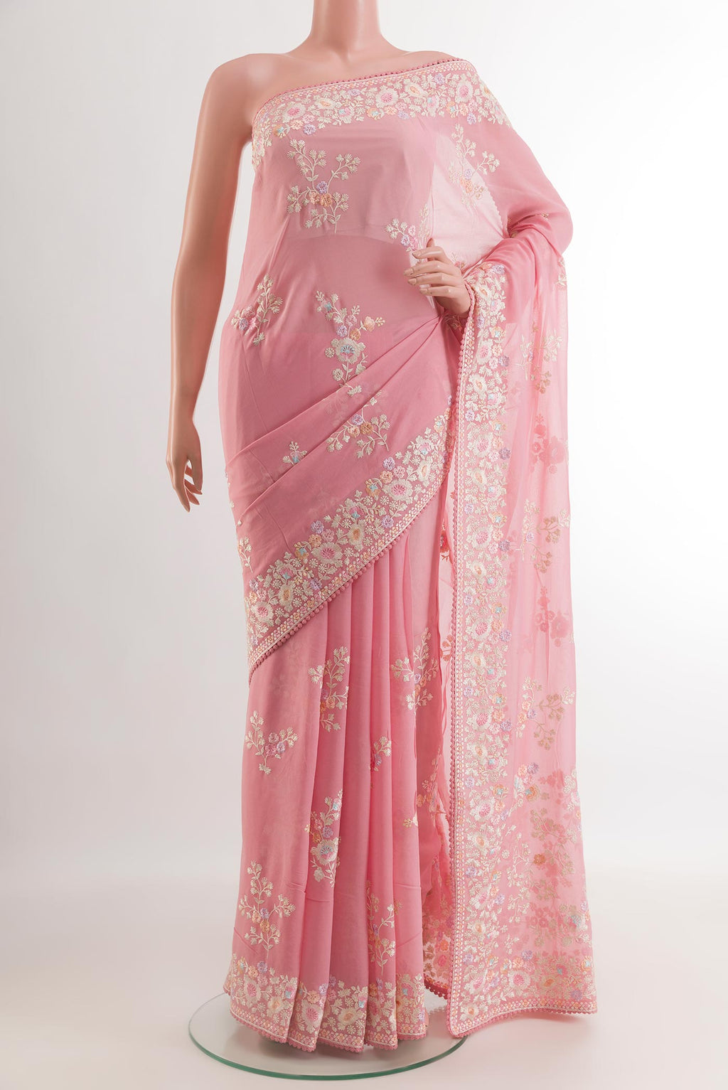 Pink Georgette Saree with Embroidery on the body and Embroidery Border.  displayed on a mannequin