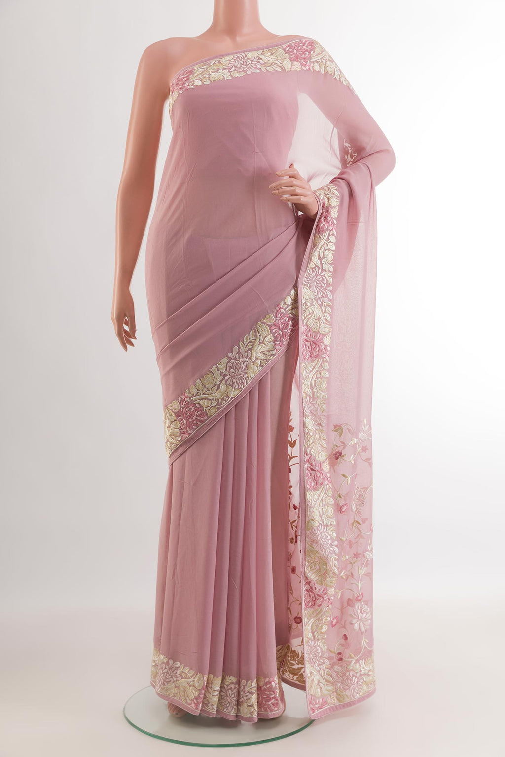Lavender Georgette Saree with Embroidery on the body and Embroidery Border.  displayed on a mannequin