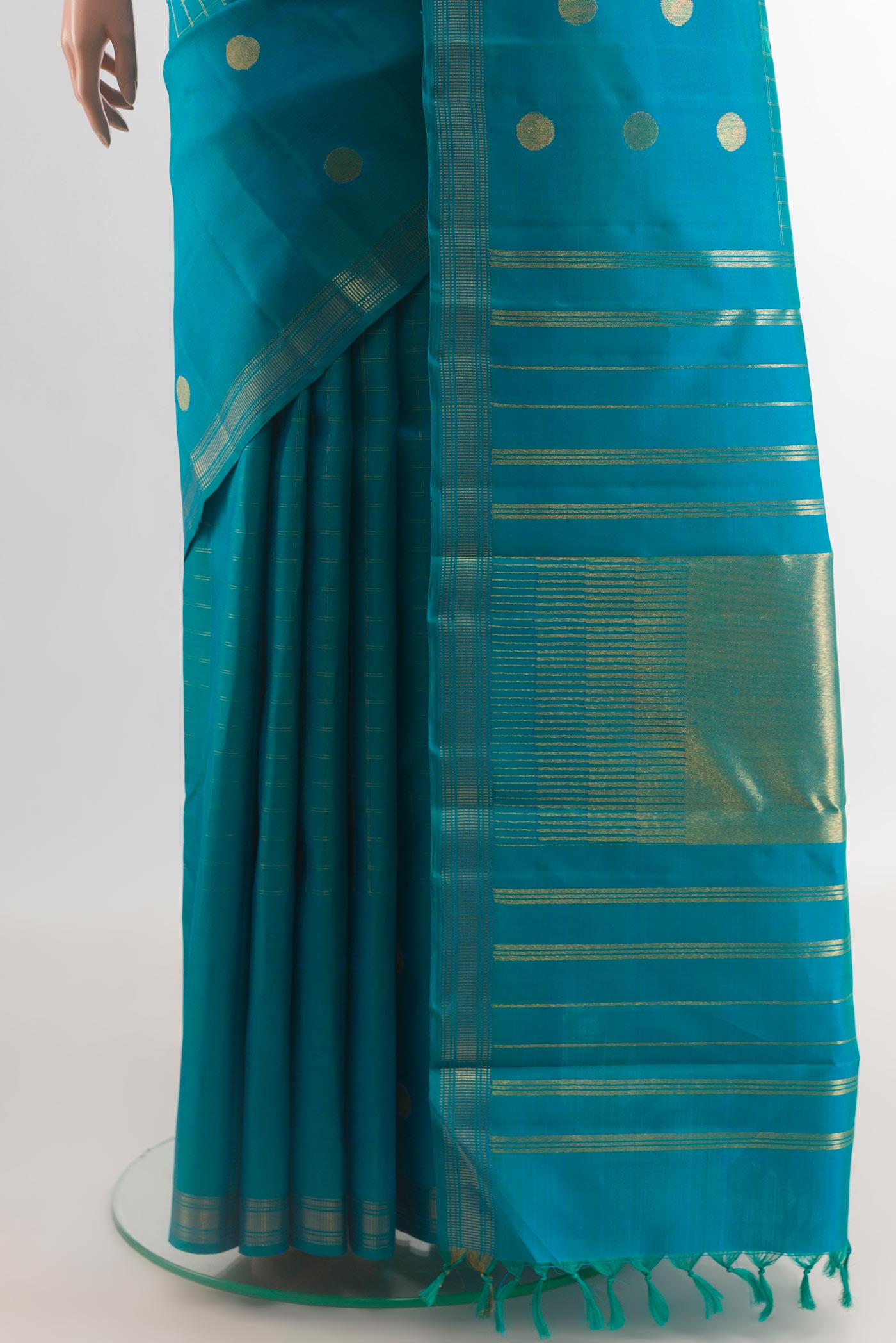 Pleats and pallu of Blue Kanchipuram Silk Saree with Checked design on the body and Zari Border. 