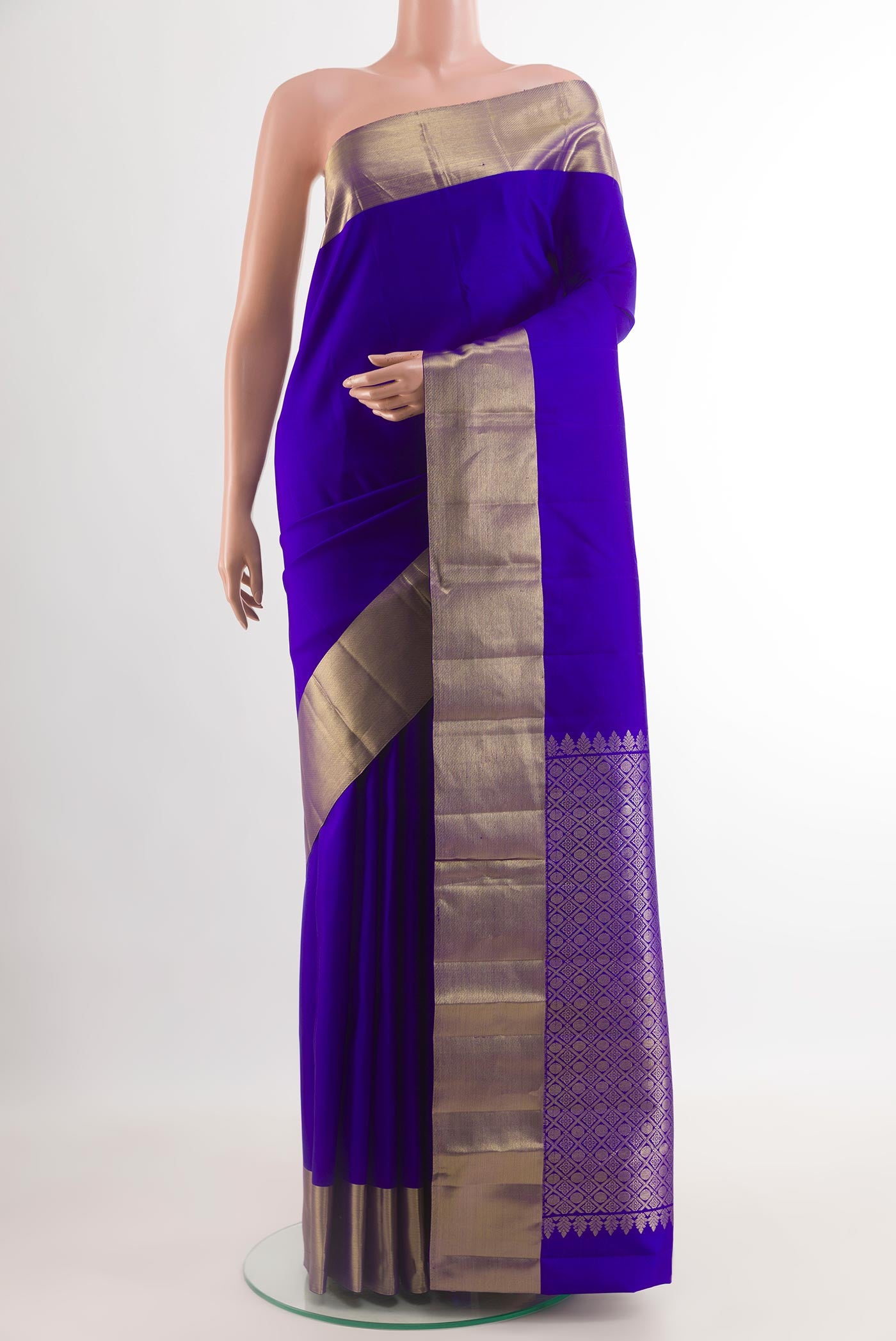Blue Kanjivaram Silk Saree with Plain Body and Zari Border.  displayed on a mannequin