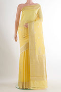 Pure Silk Yellow Banarasi Katan Saree with Zari Butta on the body and Zari Border.  displayed on a mannequin