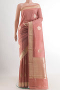 Peach Banarasi Katan Silk Saree with Zari Butta on the body and Zari Border.  displayed on a mannequin