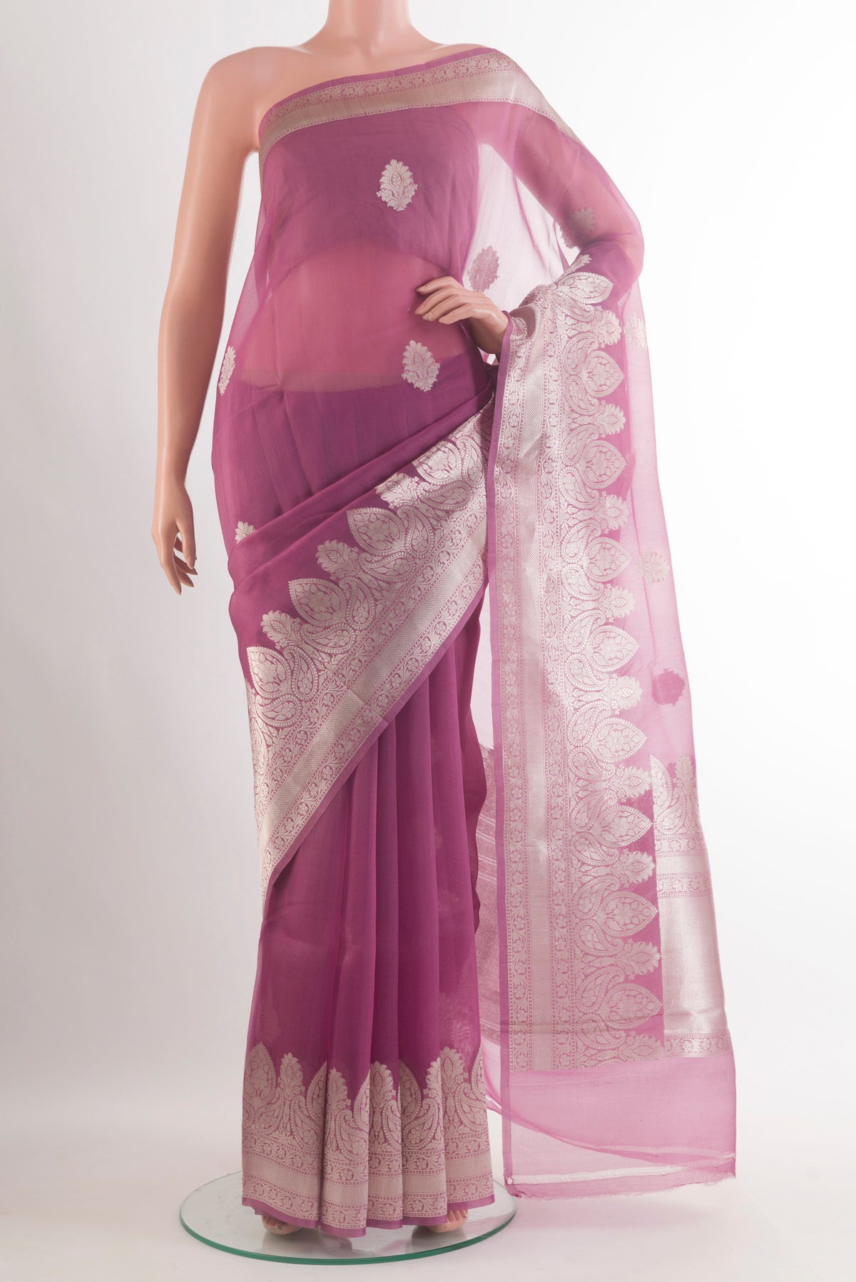 Lavender Organza Saree with Zari Butta on the body and Zari Border.  displayed on a mannequin