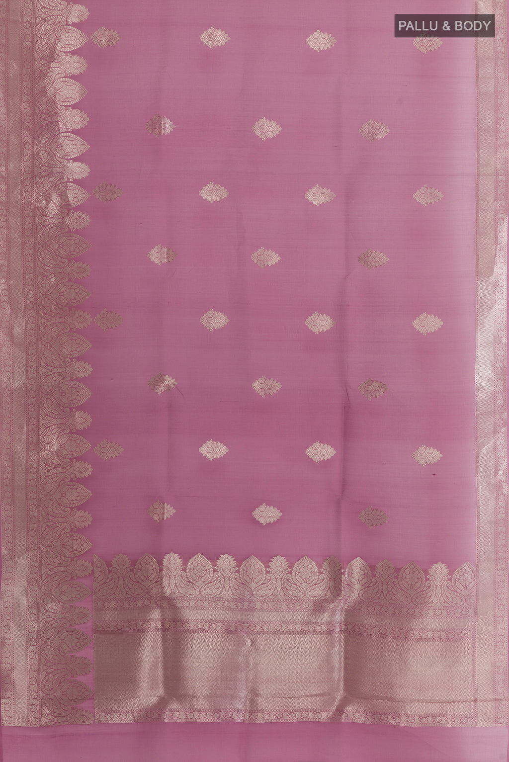 Flat view of Lavender Organza Saree with Zari Butta on the body and Zari Border. 