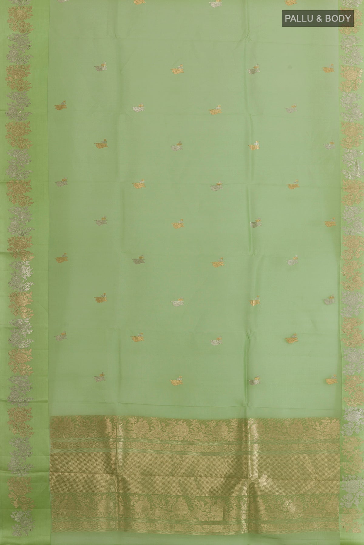 Flat view of Pista Green Organza Saree with Zari Butta on the body and Zari Border. 
