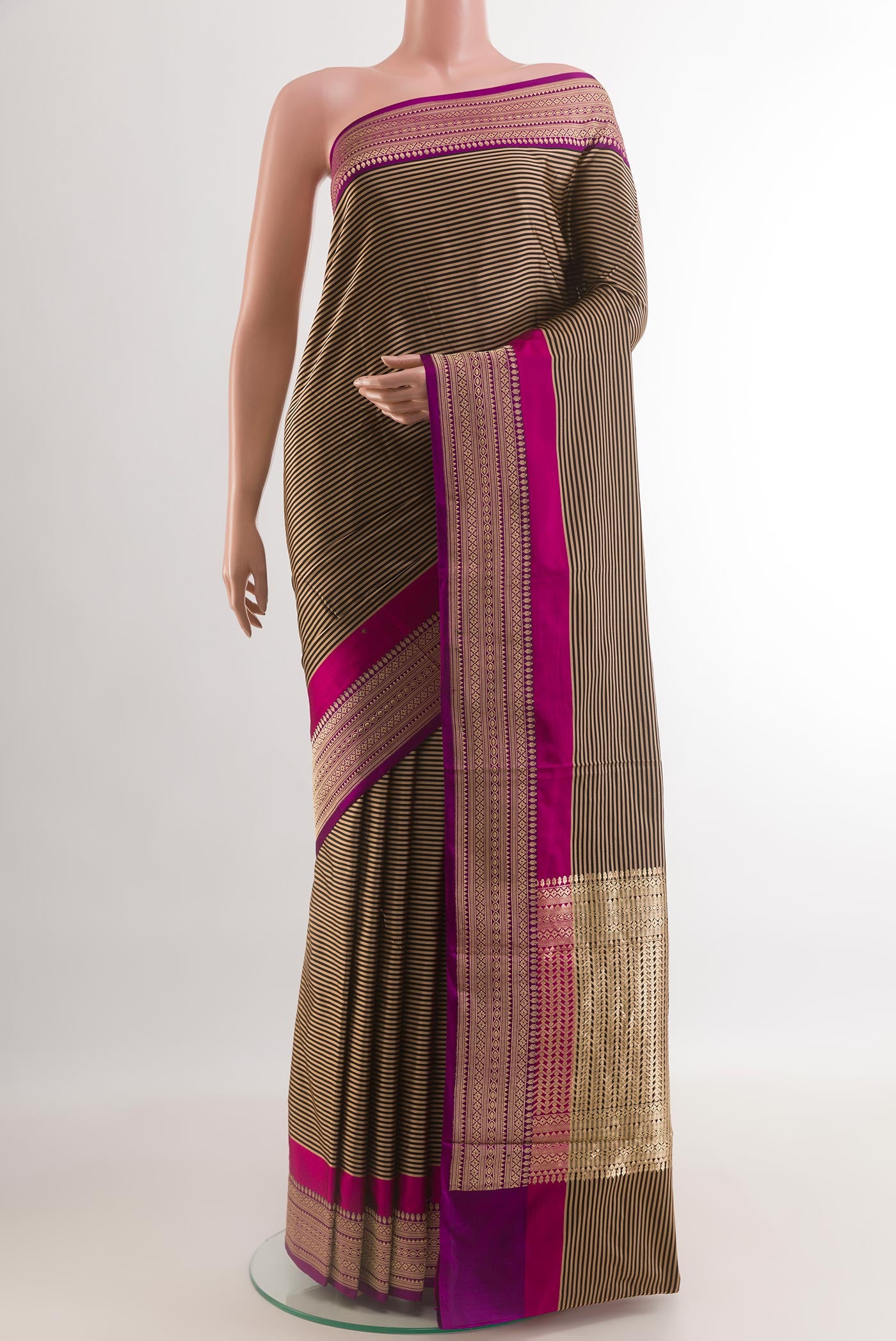 Black Banarasi Katan Silk Saree with Stripes on the body and Zari Border.  displayed on a mannequin