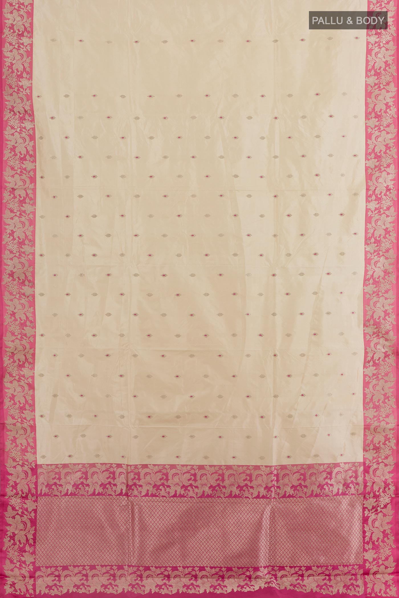Flat view of Off White Banarasi Katan Silk Saree with Zari Butta on the body and Zari Border. 