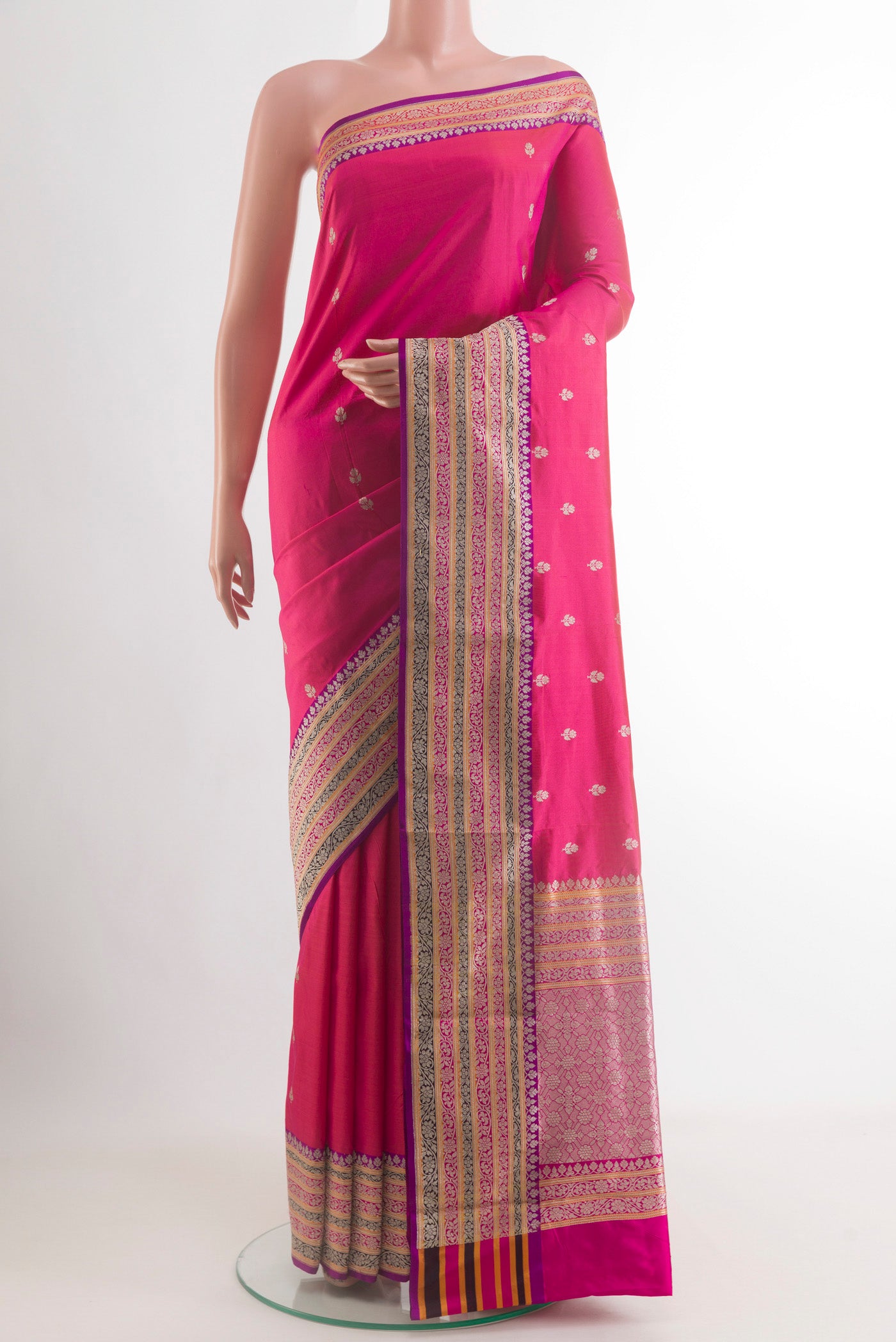 Pink Banarasi Katan Silk Saree with Zari Butta on the body and Zari Border.  displayed on a mannequin