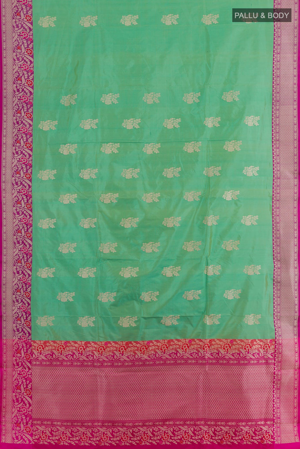 Flat view of Sea Green Banarasi Katan Silk Saree with Zari Butta on the body and Zari Border. 