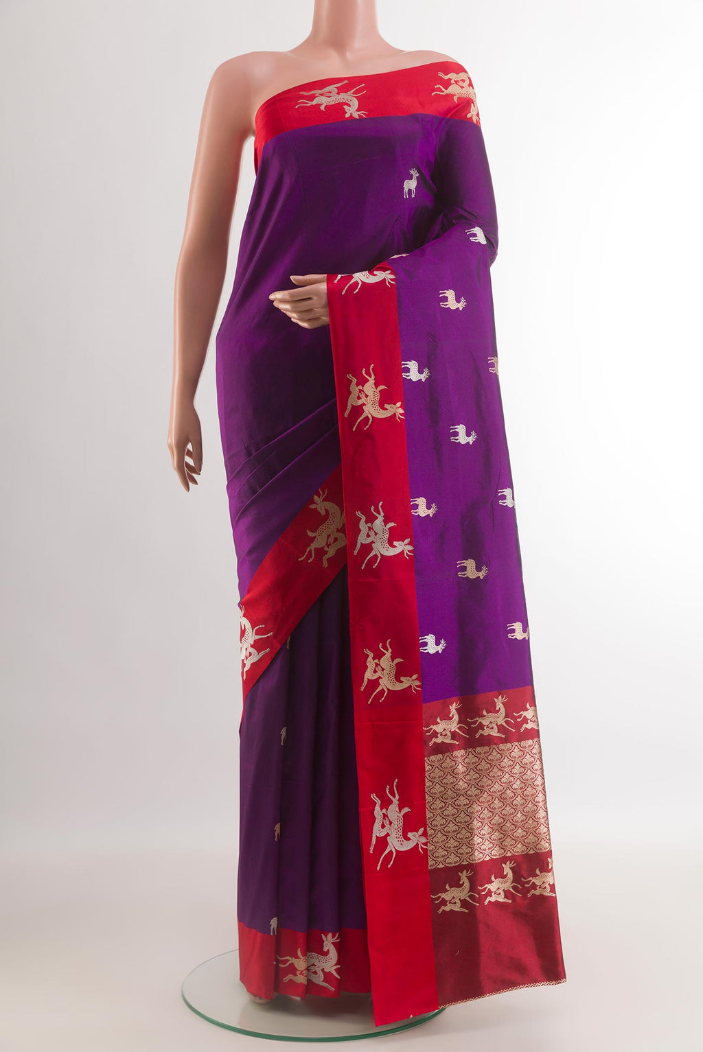 Purple Banarasi Katan Silk Saree with Zari Butta on the body and Zari Border.  displayed on a mannequin