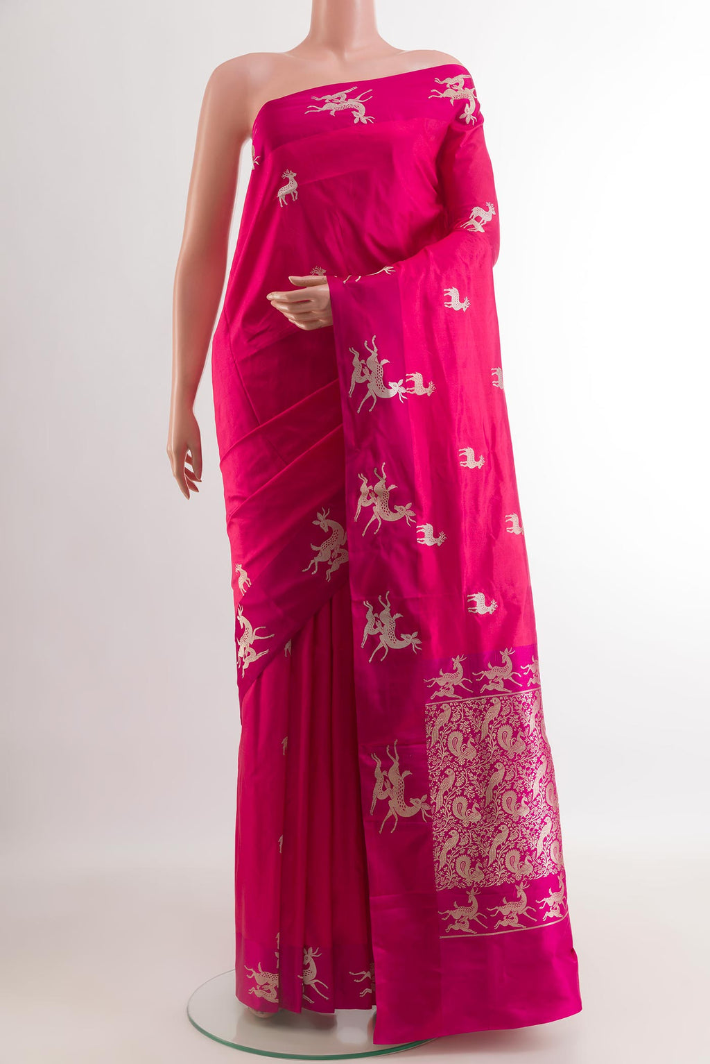 Pink Banarasi Katan Silk Saree with Zari Butta on the body and Zari Border.  displayed on a mannequin