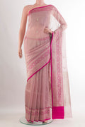Pure Silk Rose Gold Banarasi Kora Saree with Zari Butta on the body and Zari Border.  displayed on a mannequin