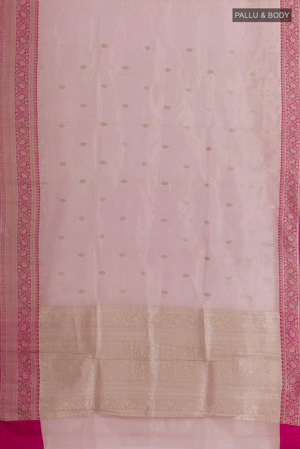 Flat view of Pure Silk Rose Gold Banarasi Kora Saree with Zari Butta on the body and Zari Border. 