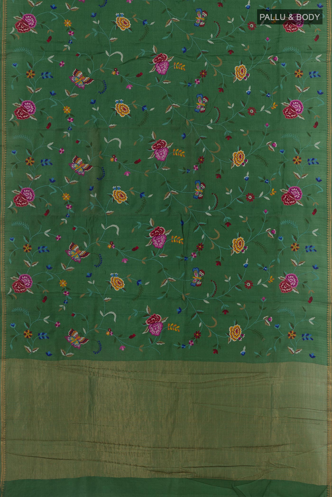 Flat view of Green Tussar Silk Saree with Embroidery on the body and Zari Border. 