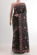 Black Tussar Silk Saree with Embroidery on the body and Embroidery Border.  displayed on a mannequin