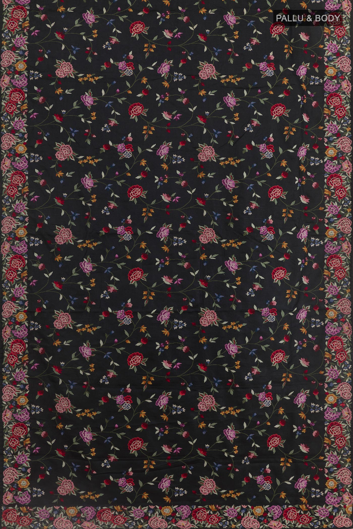 Flat view of Black Tussar Silk Saree with Embroidery on the body and Embroidery Border. 