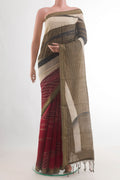 Beige Tussar Saree with Embroidery on the body and Zari Border.  displayed on a mannequin