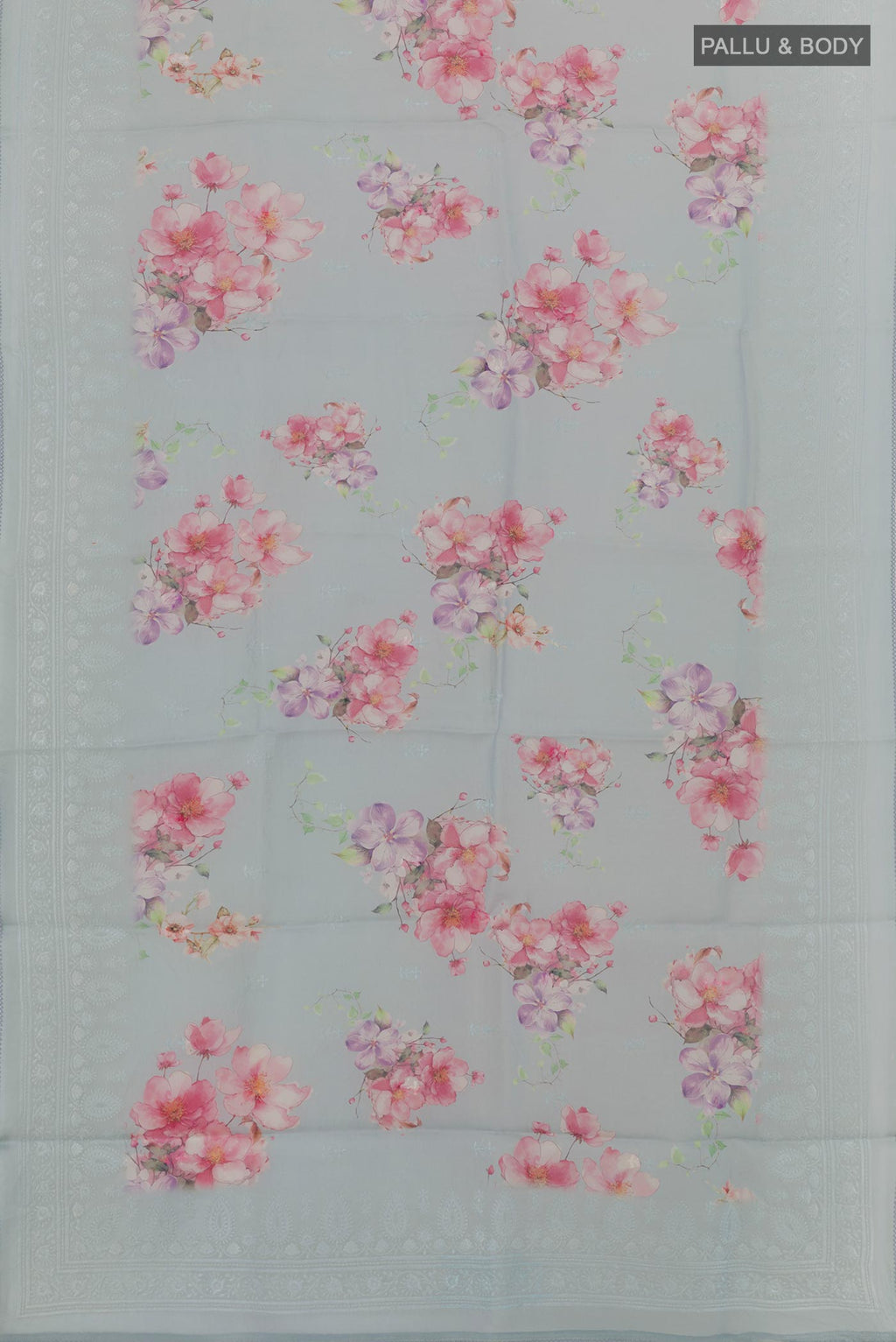 Flat view of Grey Organza Silk Saree with Floral Print on the body and Embroidery Border. 