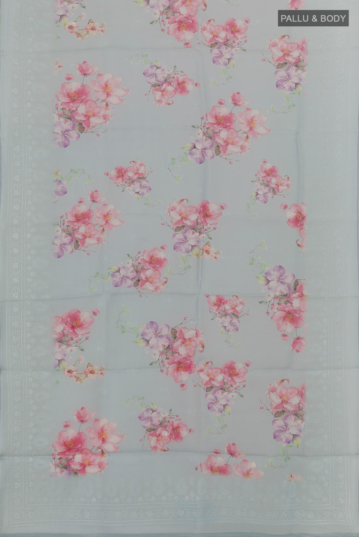 Flat view of Grey Organza Silk Saree with Floral Print on the body and Embroidery Border. 