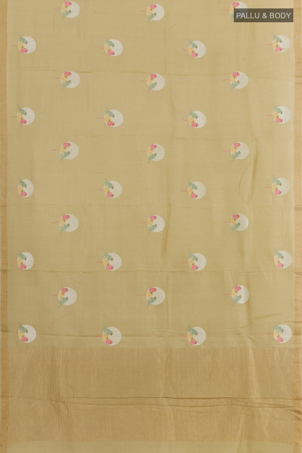 Flat view of Beige Tussar Silk Saree with Printed design on the body and Zari Border. 