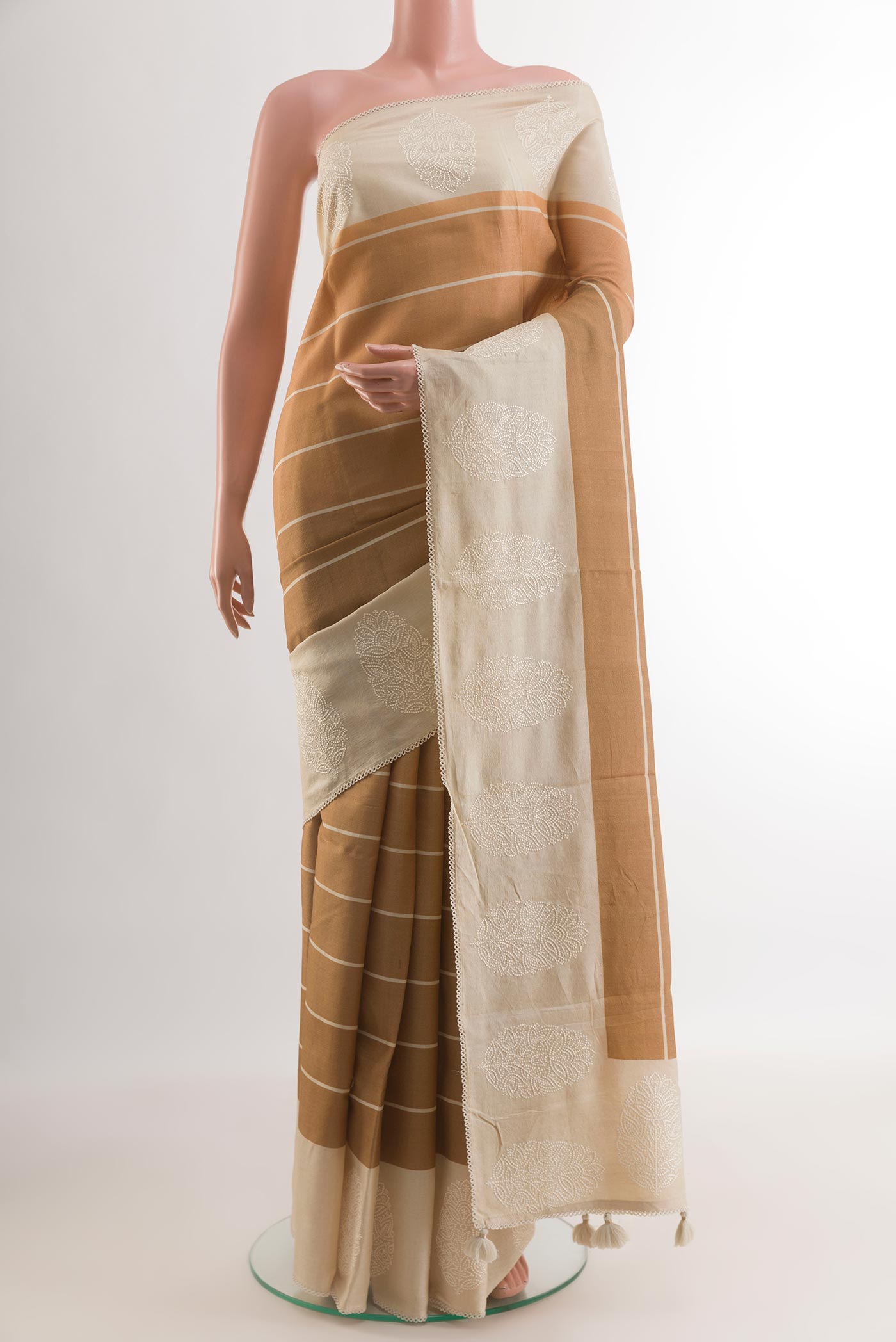 Sandal Tussar Silk Saree with Stripes on the body and Embroidery Border.  displayed on a mannequin