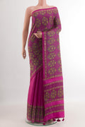 Light Magenta Tussar Silk Saree with Printed design on the body and Printed Border.  displayed on a mannequin