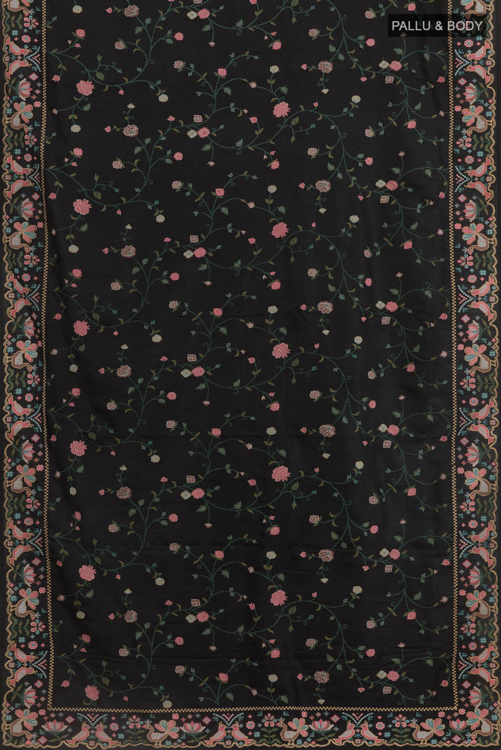 Flat view of Black Tussar Silk Saree with Embroidery on the body and Embroidery Border. 