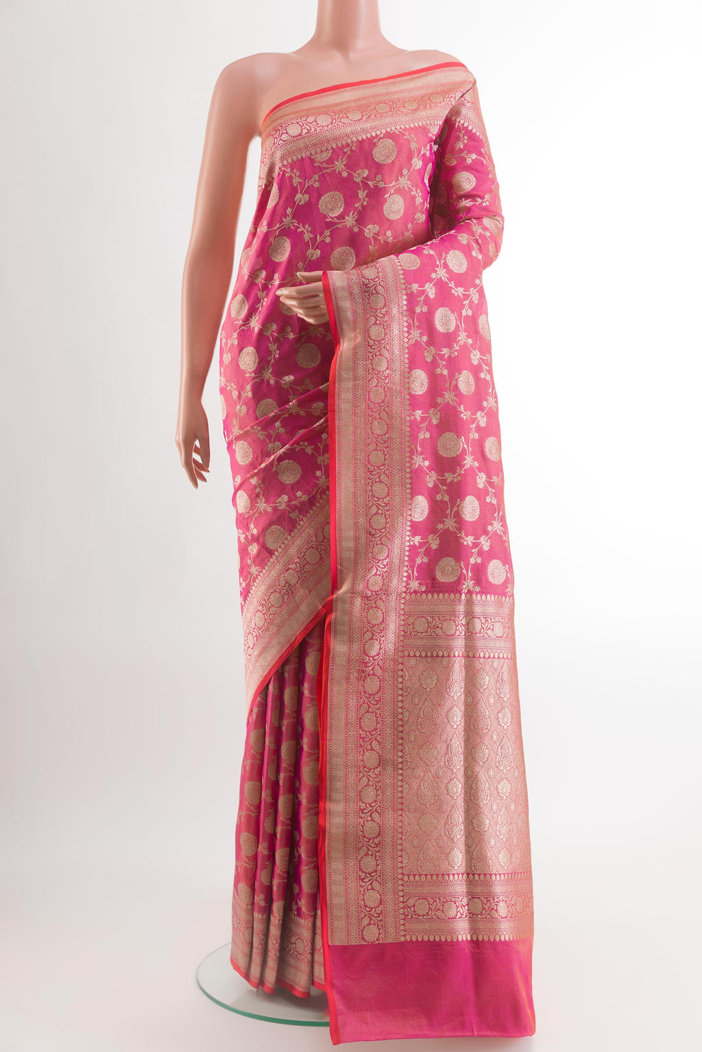 Pink Banarasi Silk Saree with Zari Brocade on the body and Zari Border.  displayed on a mannequin