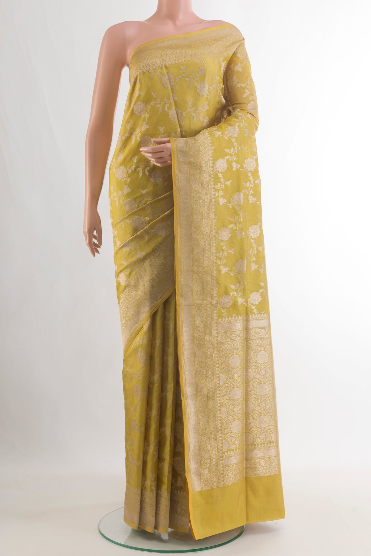 Pure Silk Yellow Banarasi Saree with Zari Brocade on the body and Zari Border.  displayed on a mannequin