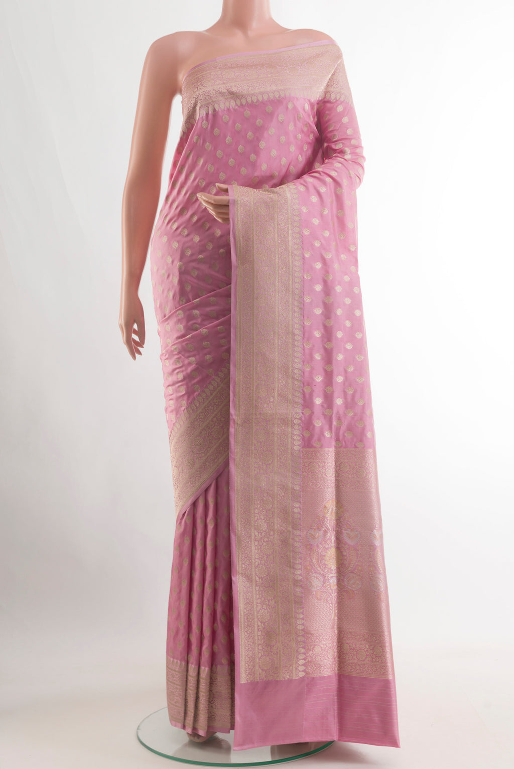 Pink Banarasi Silk Saree with Zari Butta on the body and Zari Border.  displayed on a mannequin