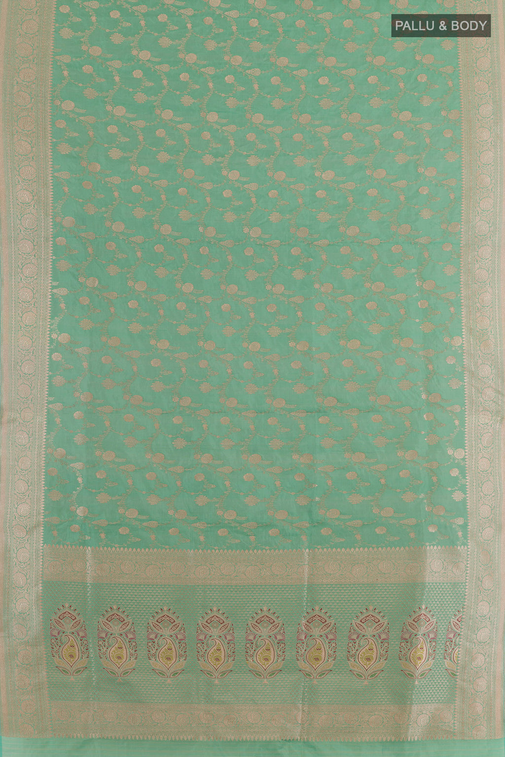 Flat view of Sea Green Banarasi Tissue Silk Saree with Zari Brocade on the body and Zari Border. 