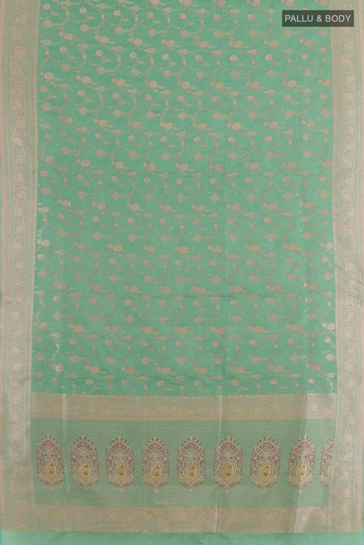 Flat view of Sea Green Banarasi Tissue Silk Saree with Zari Brocade on the body and Zari Border. 