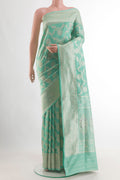 Pure Silk Sea Green Banarasi Saree with Zari Brocade on the body and Zari Border.  displayed on a mannequin