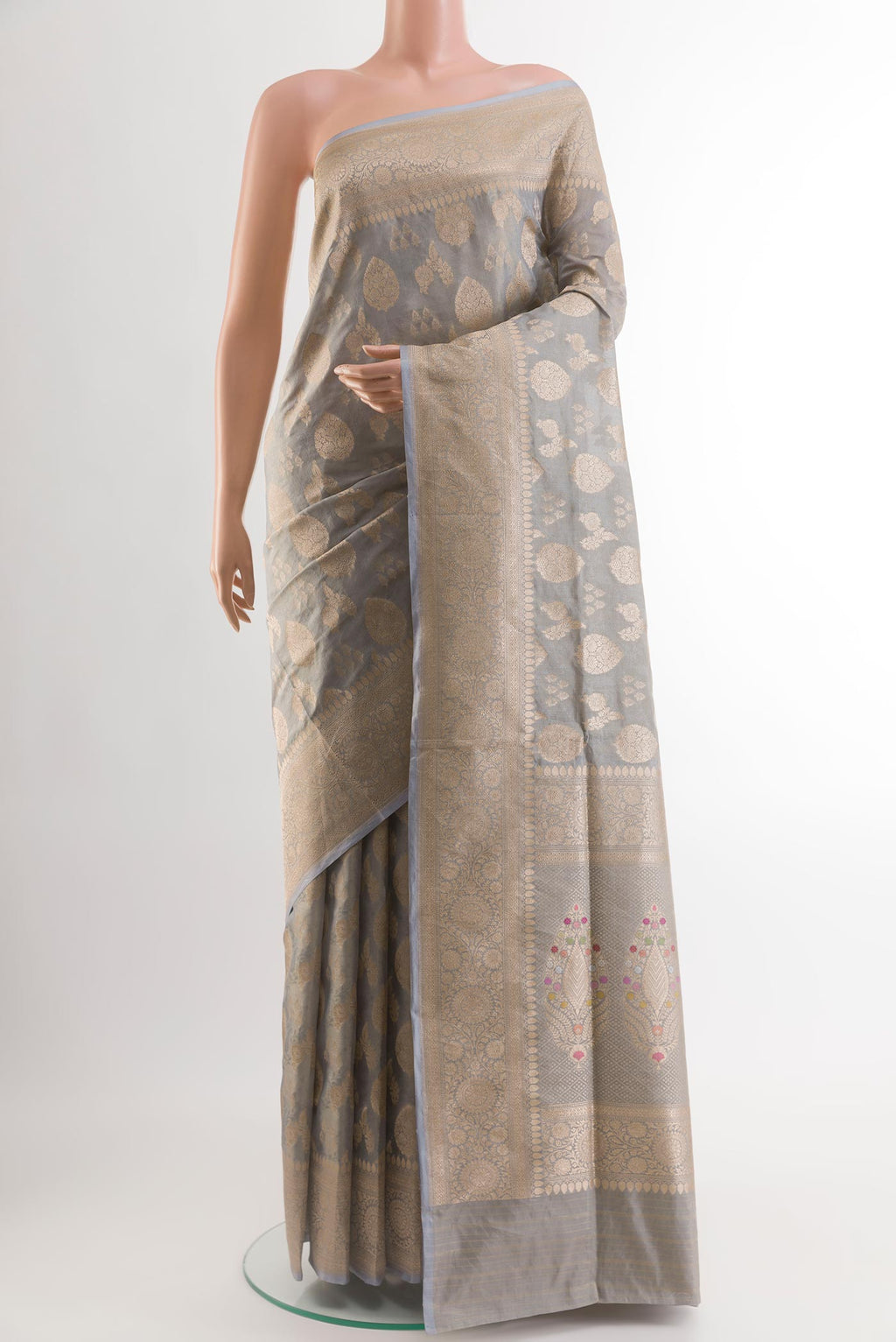 Grey Banarasi Silk Saree with Zari Brocade on the body and Zari Border.  displayed on a mannequin