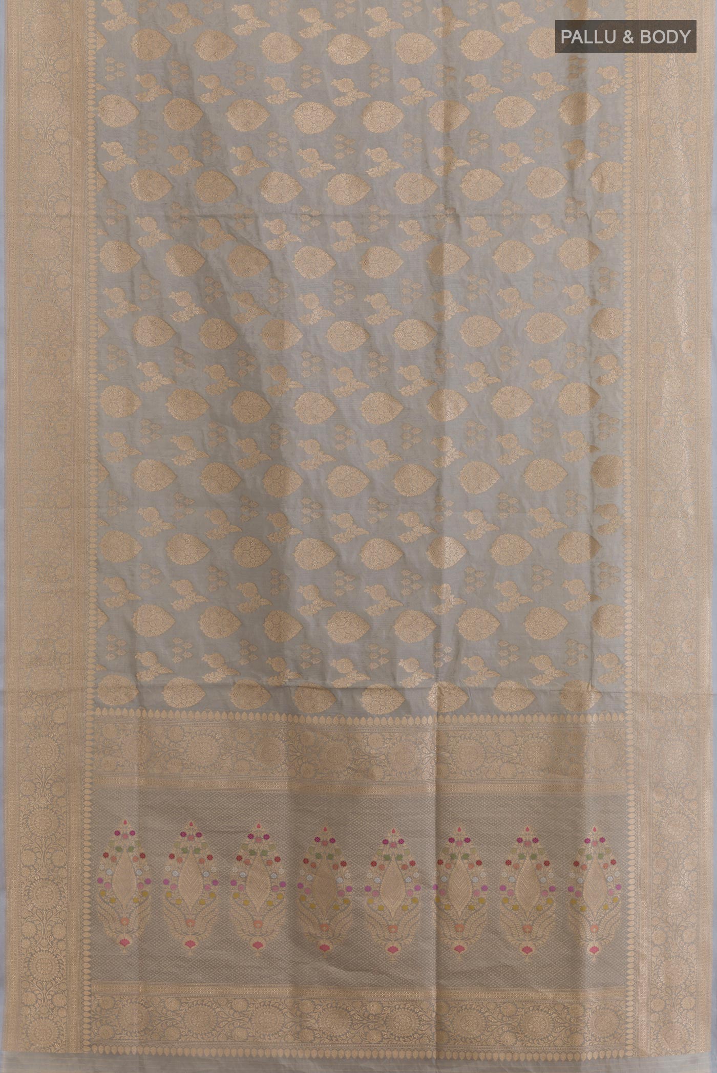Flat view of Grey Banarasi Silk Saree with Zari Brocade on the body and Zari Border. 
