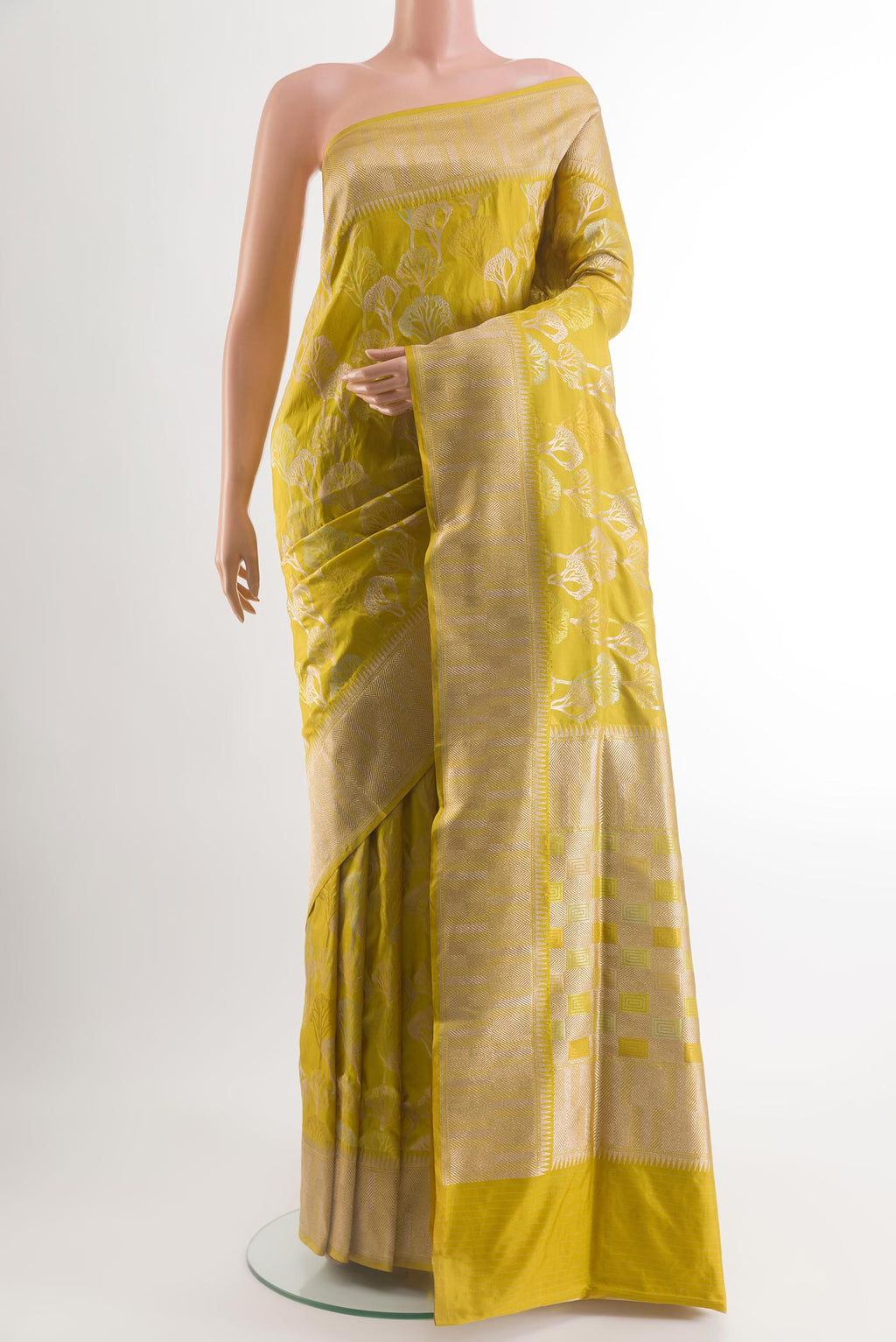 Yellow Banarasi Silk Saree with Zari Brocade on the body and Zari Border.  displayed on a mannequin