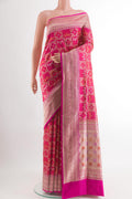 Rani Pink Banarasi Silk Saree with Zari Brocade on the body and Zari Border.  displayed on a mannequin
