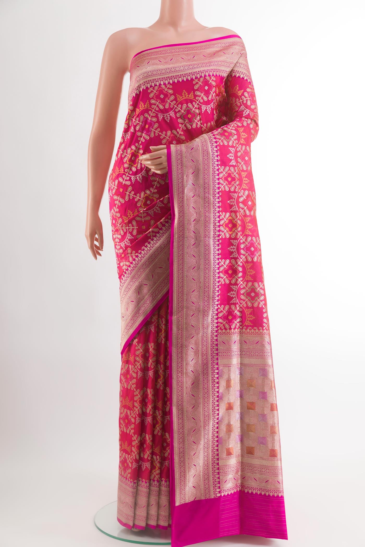 Rani Pink Banarasi Silk Saree with Zari Brocade on the body and Zari Border.  displayed on a mannequin