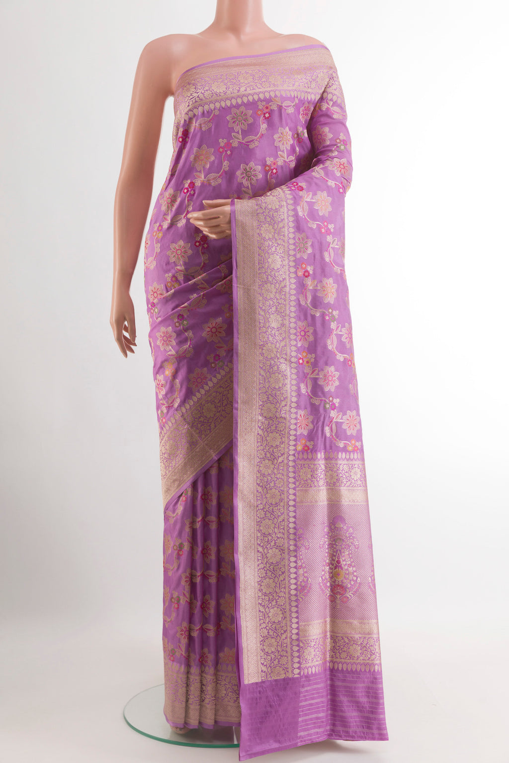 Lavender Banarasi Silk Saree with Zari Butta on the body and Zari Border.  displayed on a mannequin