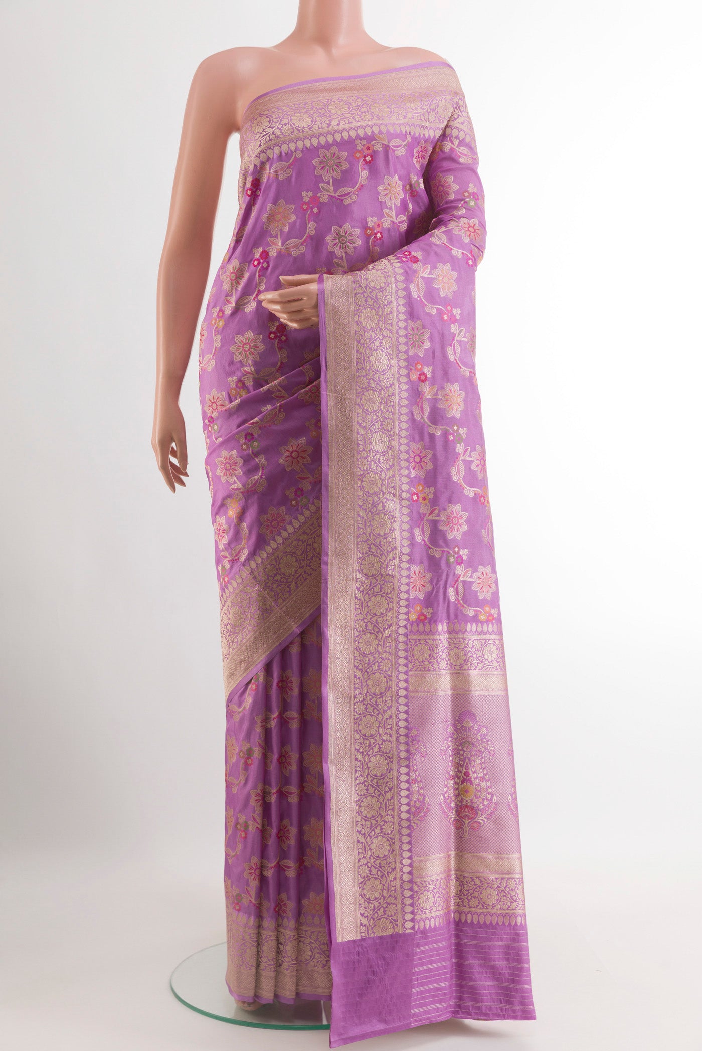 Lavender Banarasi Silk Saree with Zari Butta on the body and Zari Border.  displayed on a mannequin