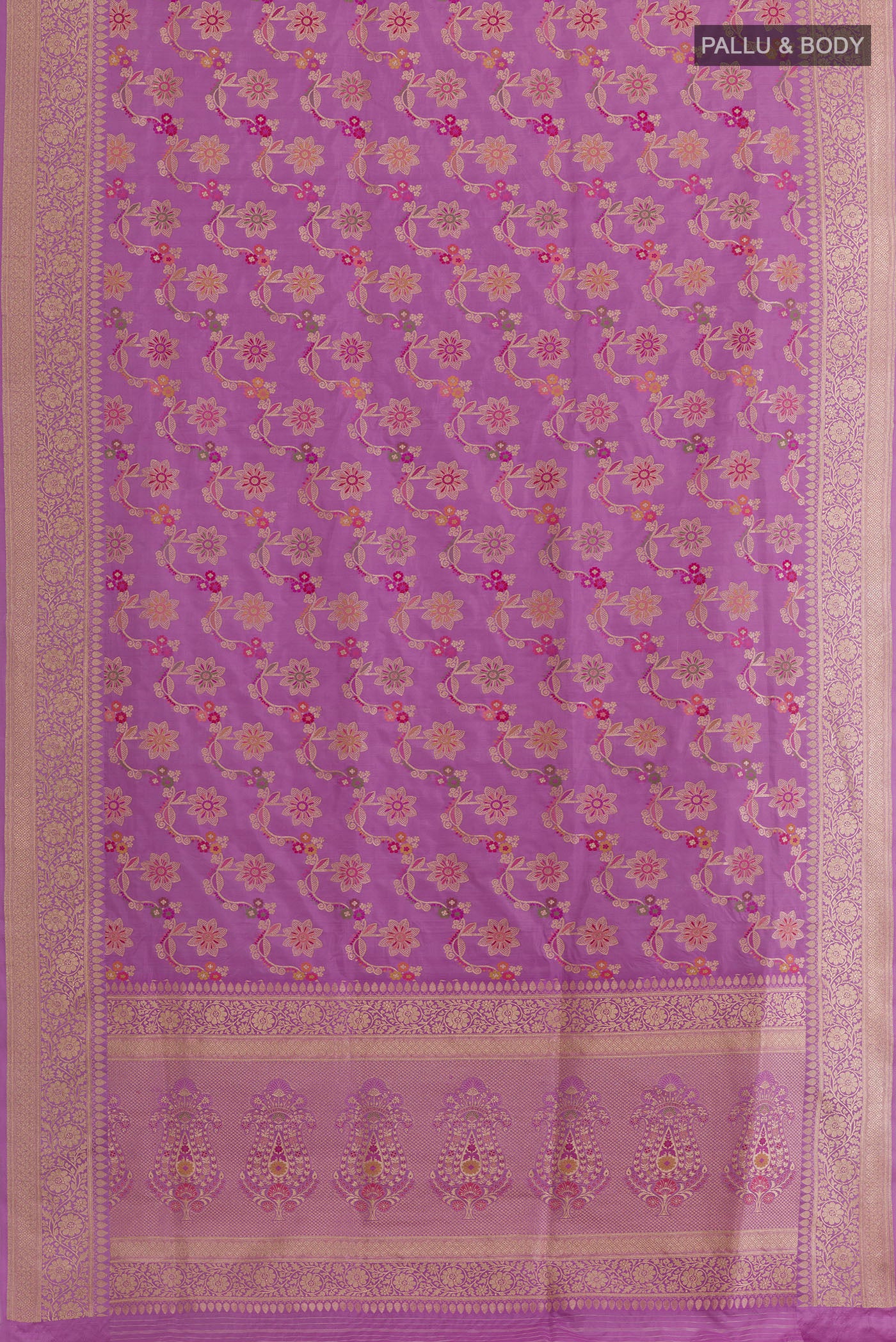 Flat view of Lavender Banarasi Silk Saree with Zari Butta on the body and Zari Border. 
