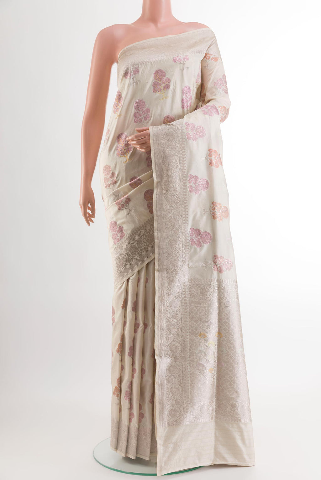 Off White Banarasi Silk Saree with Zari And Thread Butta on the body and Zari Border.  displayed on a mannequin