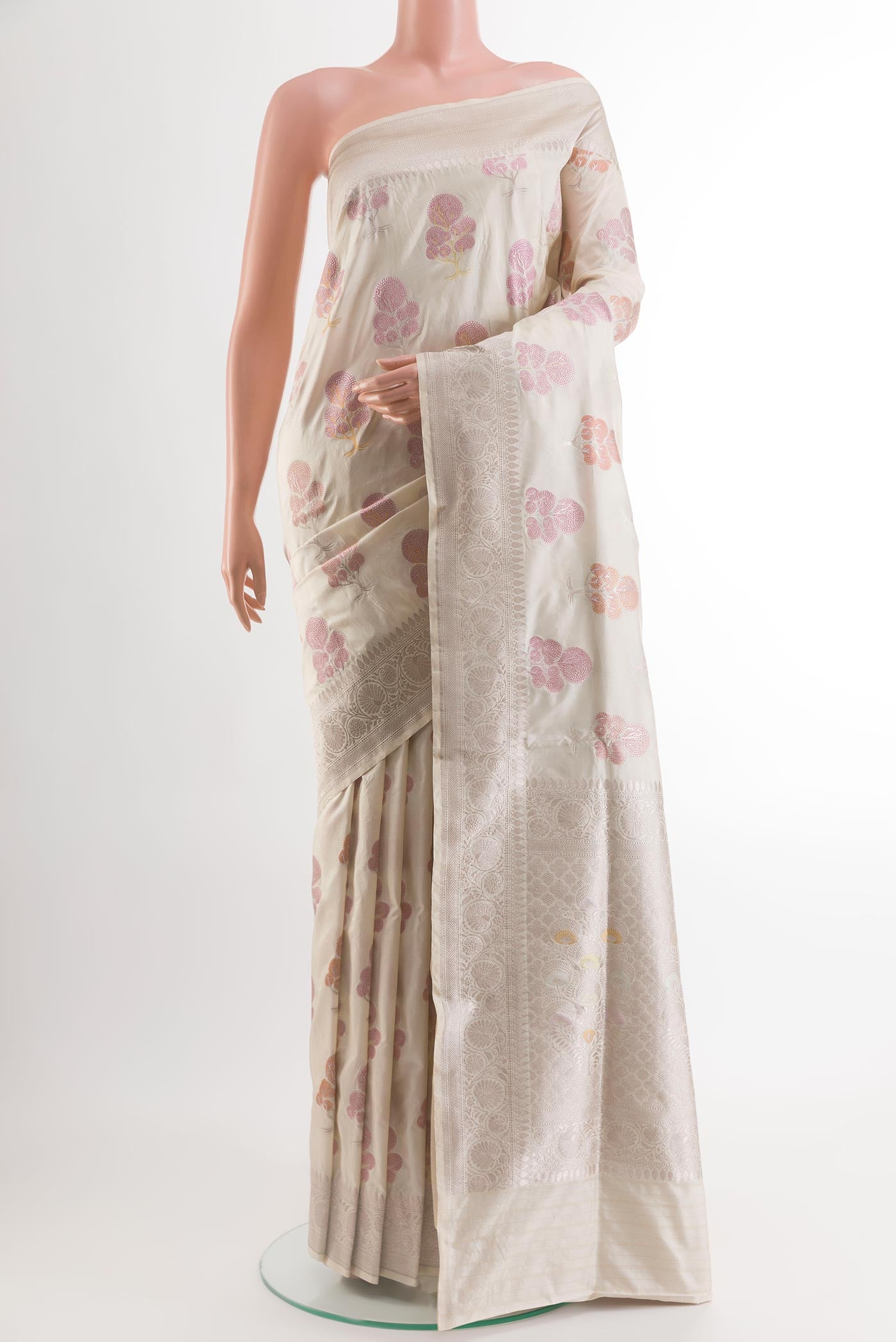 Off White Banarasi Silk Saree with Zari And Thread Butta on the body and Zari Border.  displayed on a mannequin