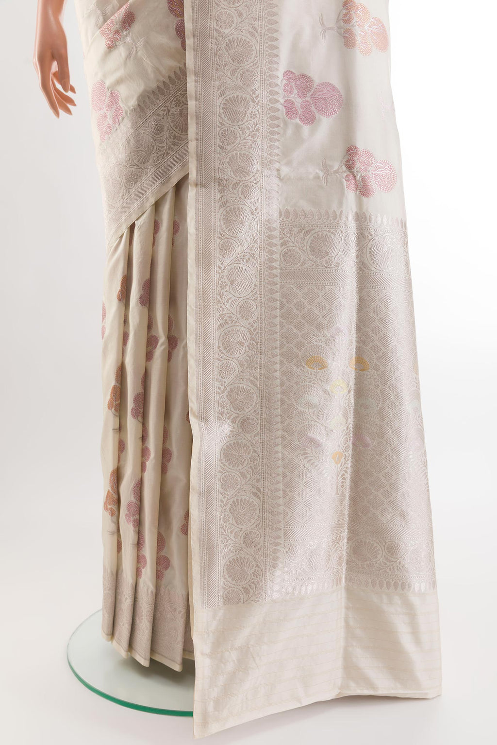 Pleats and pallu of Off White Banarasi Silk Saree with Zari And Thread Butta on the body and Zari Border. 