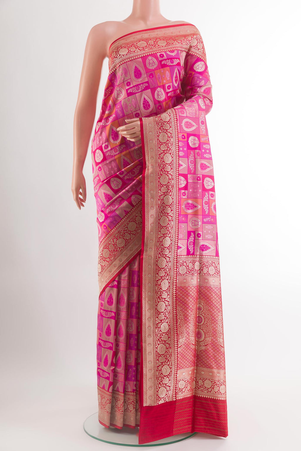 Rani Pink Banarasi Silk Saree with Zari Brocade on the body and Zari Border.  displayed on a mannequin
