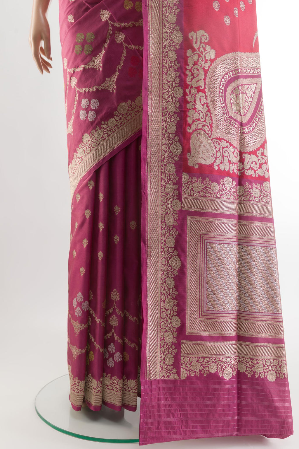 Pleats and pallu of Purple Banarasi Silk Saree with Zari Butta on the body and Zari Border. 